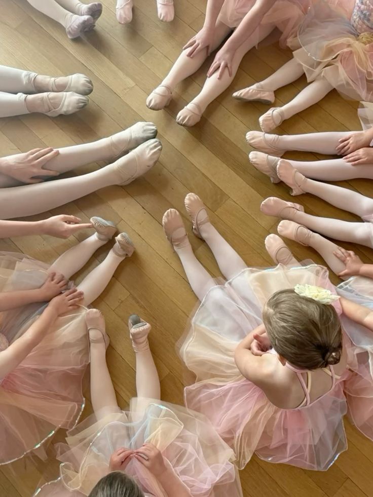 Children's ballet class sitting in a circle